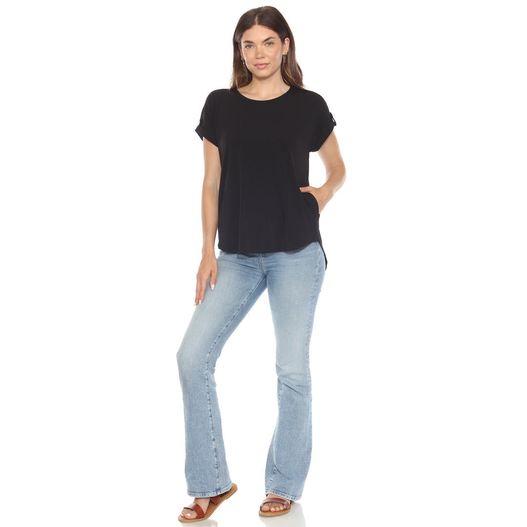 Women’s black short sleeve top with rolled cuffs and button-tab detail, relaxed fit for casual wear.