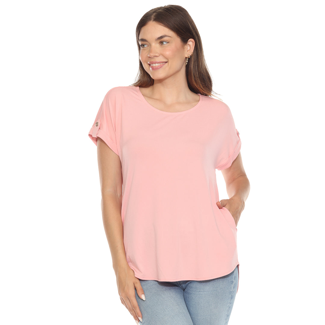 Women’s soft pink short sleeve top with rolled cuffs and button-tab detail, relaxed fit for casual wear.
