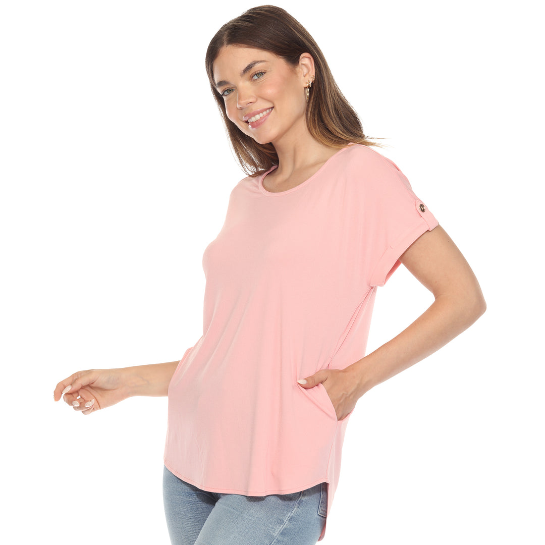 Women’s soft pink short sleeve top with rolled cuffs and button-tab detail, relaxed fit for casual wear.