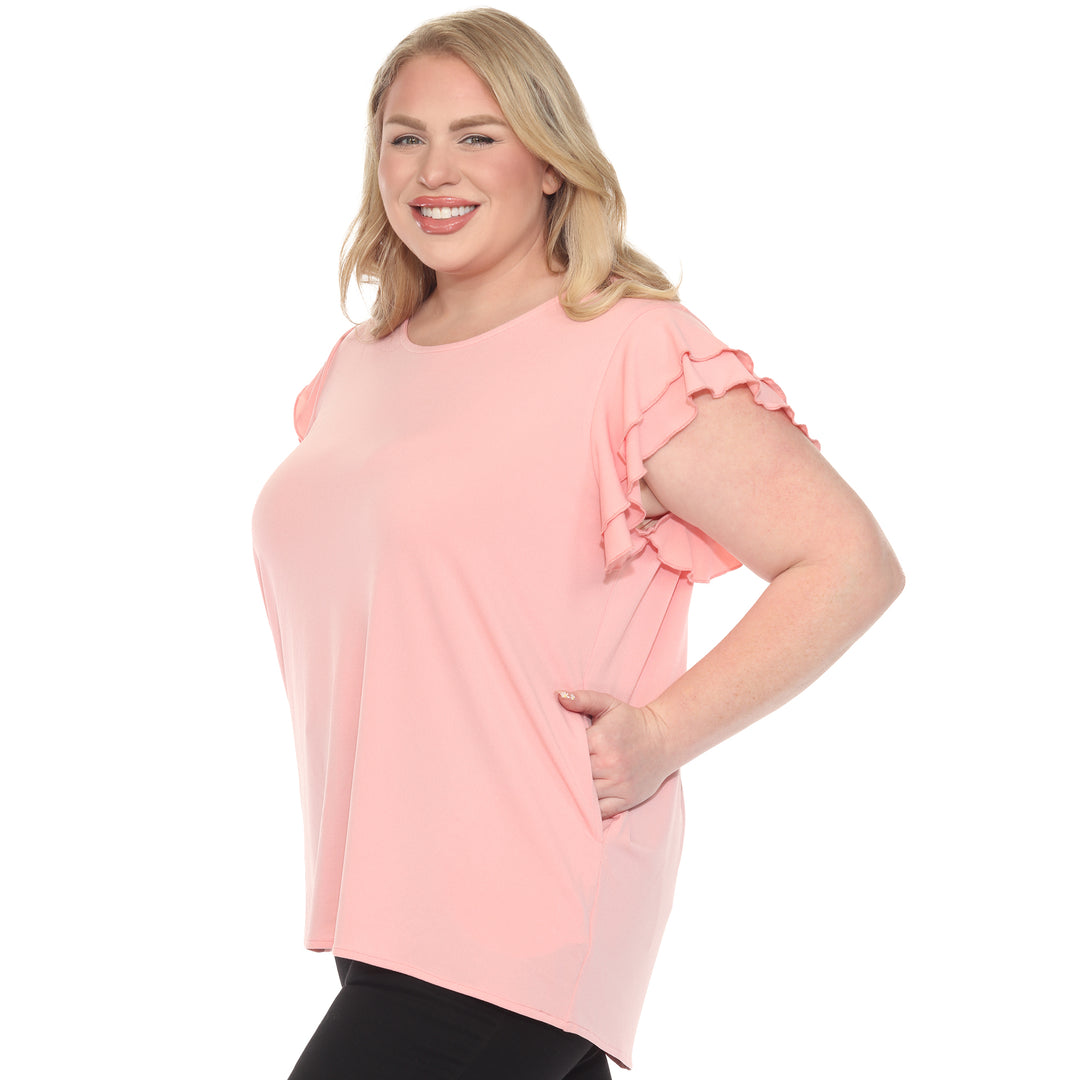 Plus size pink short sleeve top with layered ruffle sleeves, relaxed fit for casual or dressy wear