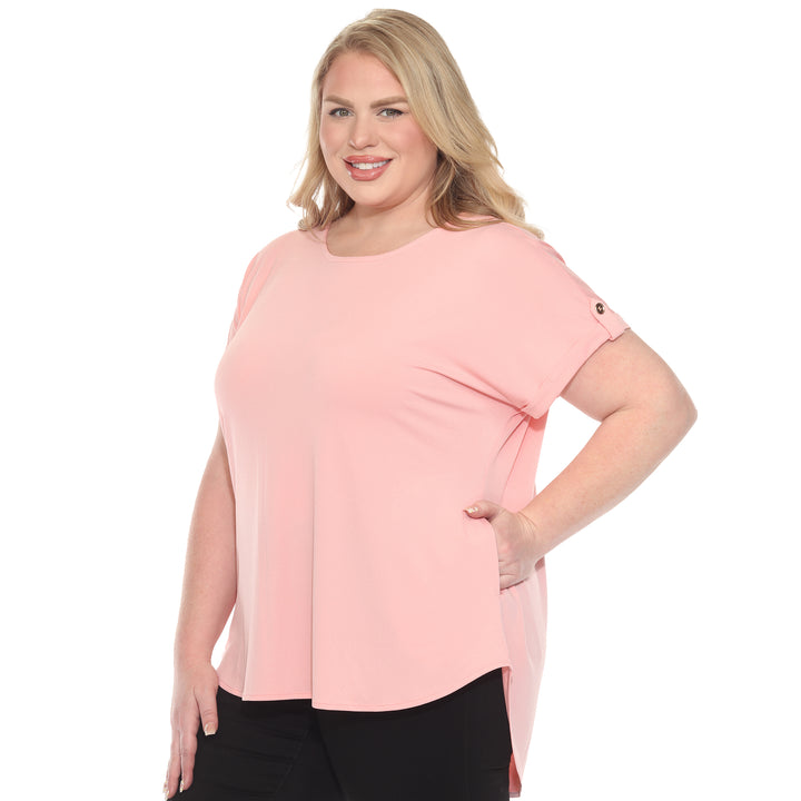 Plus size Pink short sleeve top in soft knit, featuring button-tab detail, ideal for casual everyday wear.