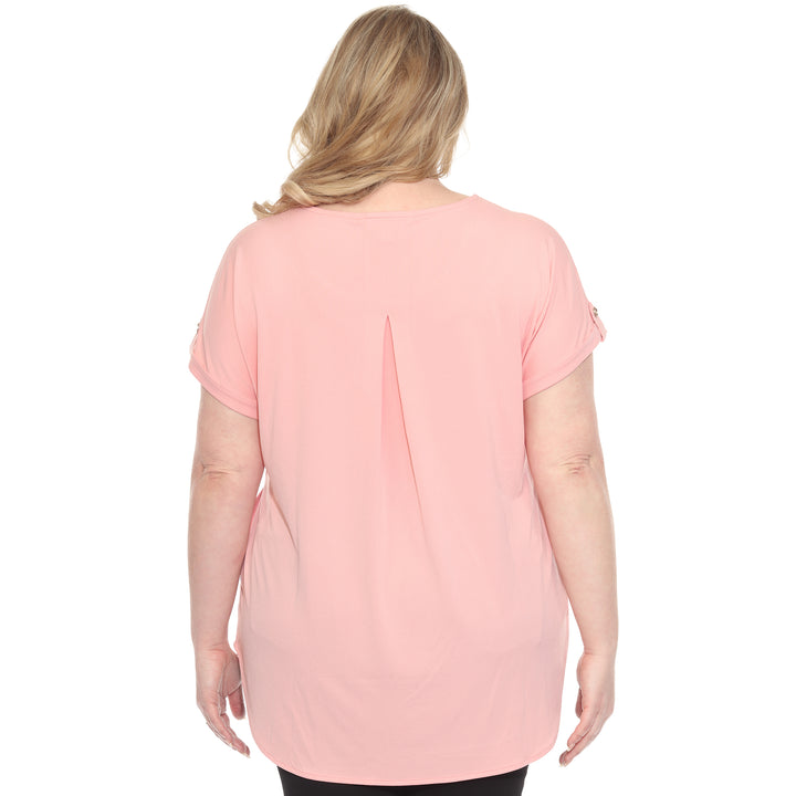 Plus size Pink short sleeve top in soft knit, featuring button-tab detail, ideal for casual everyday wear.