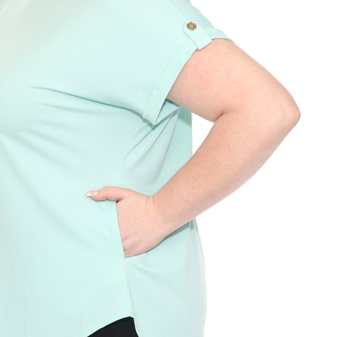Plus size Light Aqua short sleeve top in soft knit, featuring button-tab detail, ideal for casual everyday wear.
