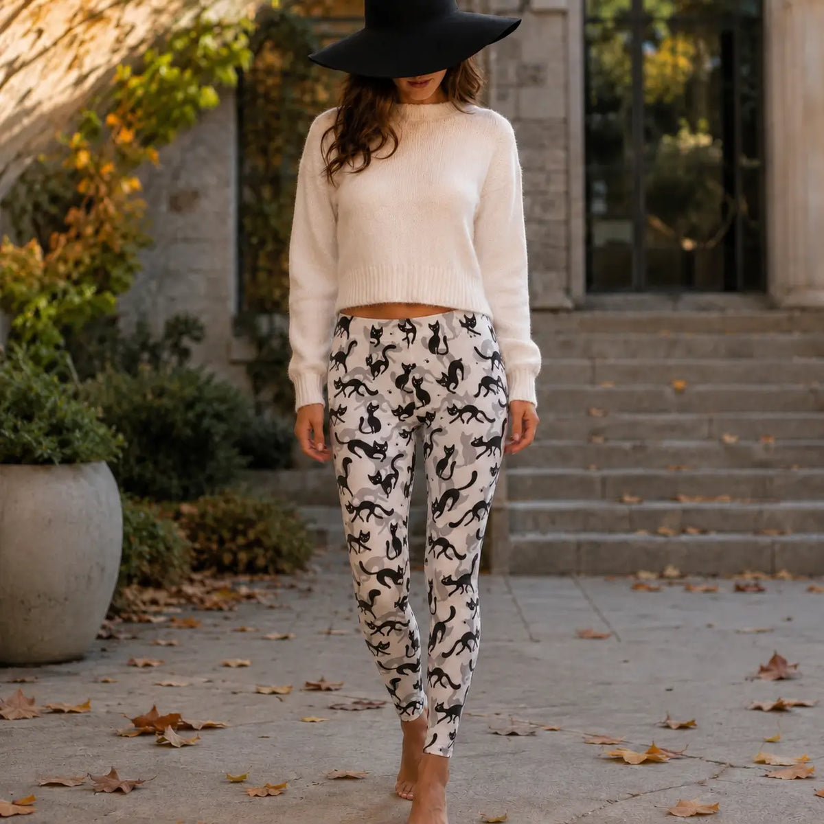 Black and white cat-print leggings with cream cropped sweater - White Mark