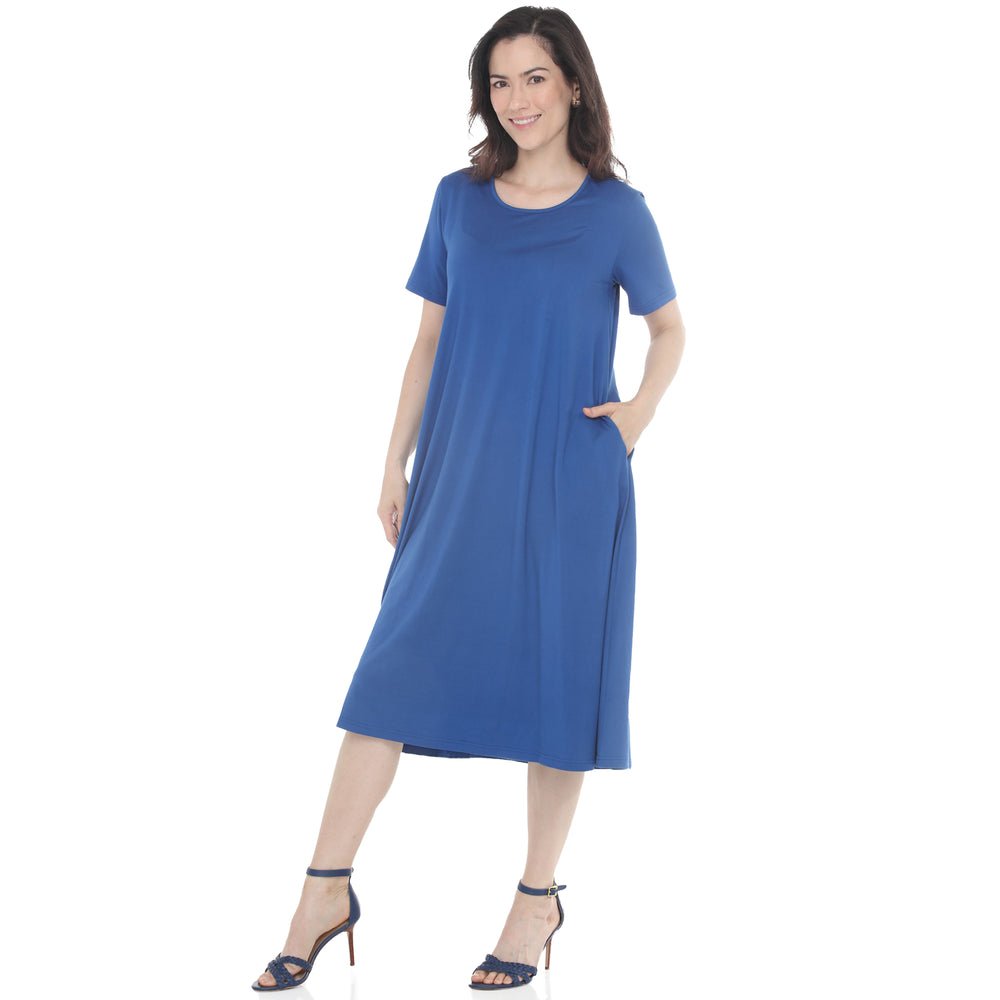 Woman wearing a casual tee swing midi dress with pockets in Blue