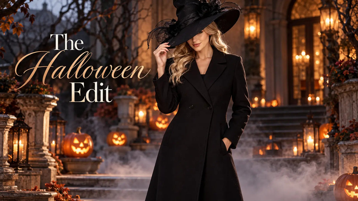 The Halloween Edit - woman in black coat and hat beside glowing pumpkins - White Mark